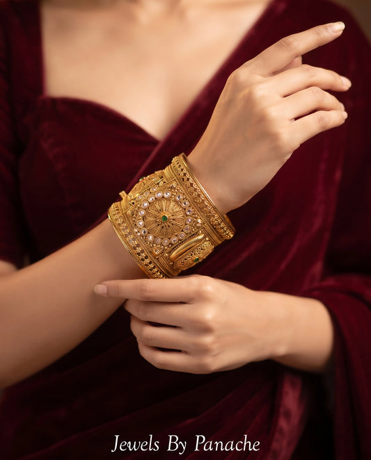 Heritage gold colour bridal kada bracelet with carved detailing and embedded stones for Indian wedding jewellery in Sydney